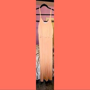 This is a Flowey, Coral colored summer sundress !